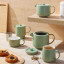 Maxwell & Williams Cafe Life Teapot with Infuser, 1L - Teal set on the table 