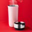 Le Creuset On The Go Vacuum-Insulated Stainless Steel Travel Mug, 350ml - Shell Pink with hot water