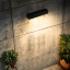 Litehouse Solar Outdoor Wall Light with Motion Sensor on the wall