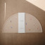Mushie Silicone Placemat - Rocket packaging on the table