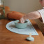 Mushie Silicone Suction Bowl, 280ml - Stone on a placemat