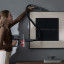 Xiaomi G20 Max Cordless Vacuum Cleaner on a picture frame