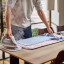 Joseph Joseph Swift Ironing Mat - Peach Blossom with an iron
