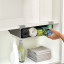 Joseph Joseph Cupboard Store Large Under-shelf Organiser on a bathroom shelf