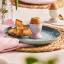 Le Creuset Jardin Relief Stoneware Side Plate, 22cm - Sea Salt on the table