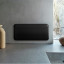Mill Invisible WiFi Panel Heater, 1500W - Black mounted on the wall