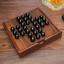 Suck UK Iron & Glory Wooden Solitaire Set on the table