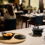 Le Creuset Gourmet Matte Black Collection Cast Iron Mini Braisers with Lids, Set of 4 on the table