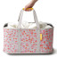 Joseph Joseph Hold-All Peach Collapsible Laundry Basket, 35L held on the handle