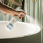 GoodBasics Probiotic Bathroom Cleaner, 500ml sprayed on the bathtub