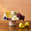 Jamie Oliver Big Love Stoneware Showstopper Stand, 31cm with fruits and cheese blocks
