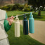 Fieldbar Signature Shades Collection Field Bottle, 750ml - Bazaruto Blue with other colours on a golf stick