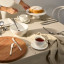 Maxwell & Williams Diamonds Stainless Steel Cutlery Set, 42-Piece on the table