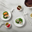 Maxwell & Williams White Basics Porcelain Chopstick Entertainment Set, 12-Piece on the table with food