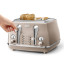 DeLonghi Icona Metallics 4-Slice Toaster, 1800W - Beige with toasted bread