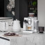 DeLonghi Rivelia Bean to Cup Coffee Machine with Bean Switch - Arctic White with a kettle and a toaster