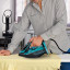 Kenwood Premium Steam Iron, 3100W ironing a shirt