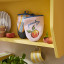 Ulster Weavers Summer Fruits Microwave Mitts, Set of 2 on a shelf