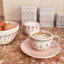 Cath Kidston Painted Table Teacup & Saucer Set with coffee on the table