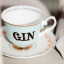 Yvonne Ellen Boozy Gin Teacup & Saucer Set on the table