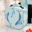 Yvonne Ellen Whale Lunch Bag on the table