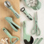 Fusion Twist Garlic Press - Mint with other kitchen tools
