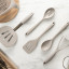 Fusion Twist Silicone Solid Spoon - Grey on with other utensils 