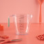 Fusion Twist Measuring Jug, 1L - Mint on the kitchen counter
