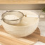 Kitchen Pantry Stainless Steel Sieve on a bowl