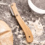 Kitchen Pantry Dough Scoring Lame on the kitchen counter with flour