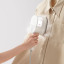 Xiaomi Handheld Steam Iron, 1200W steaming a shirt
