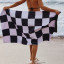 Saltii Kraalbaai Summer Waffle Beach Towel, 80cm x 160cm held at the beach