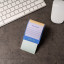 Kikkerland Sticky Note Dispenser on a desk