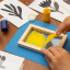 Kikkerland Make Your Own Screen Prints Activity Set on a blue chart