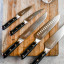 Soshida Ultra Chef Knife Set, 5-Piece on a chopping board