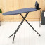 Brabantia  Denim Blue Ironing Board with Steam Iron Rest, 110cm x 30cm with an iron