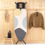 Brabantia Spring Bubble Ironing Board with Solid Steam Iron Rest, 124cm x 45cm against a wall