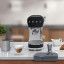 Smeg Retro Manual Espresso Coffee Machine - Glossy Black on the kitchen counter