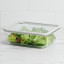 Kitchen Pro Airlock Rectangular Glass Container - 2.6L with green salad on the kitchen counter