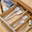 Rosti Classic Cooking Spoon Set, 4-Piece - White in a drawer
