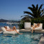 Sunnylife Luxe Floating Chair -  Casa Cream in a pool