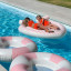 Sunnylife Twin Heart Lie-On Float - Stole My Heart Pink Stripe in the pool