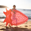 Sunnylife Luxe Lie-On Float - Strawberry Pink at the beach