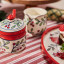 Humble & Mash Christmas Ceramic Sugar Bowl and Spoon, 8cm on a table with a slice of cake