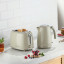 Kenwood Eterna 2-Slice Toaster, 930W - Beige with a kettle on the kitchen counter
