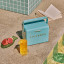 Fieldbar Mini Bar, 4L - Bazaruto Blue by the pool with a book and a cocktail