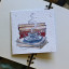 Growing Paper Coffee and Books Greeting Card on a book showing scale