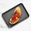 Kitchen Pro Bakewell Baking Tray - 25cm x 17cm with bread and tomatoes