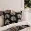 Thread Office Fan Palm Leaf Embroidered Scatter Cushion with Feather Blend Inner, 60cm x 60cm on a bed with other scatters