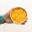 CandleCan Peeled Tangerines Scented Candle handheld showing scale